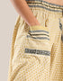 Harem pants with a wide elastic waistband